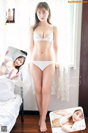 A woman in a blue lingerie posing for the camera.