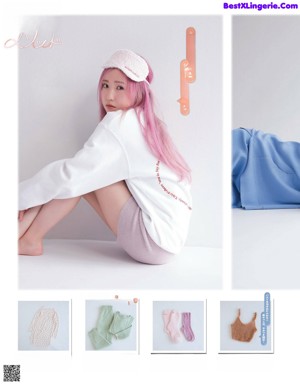 A magazine with a picture of a girl with pink hair.
